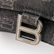 Shop this 100% authentic Balenciaga Black Denim BB Hourglass Small Bag at Labellov.com