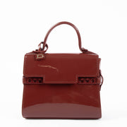 Shop the authentic Delvaux Rouge de Pourpre Vernis Tempête Micro Bag second hand on Labellov.com