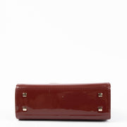 Shop the authentic Delvaux Rouge de Pourpre Vernis Tempête Micro Bag second hand on Labellov.com