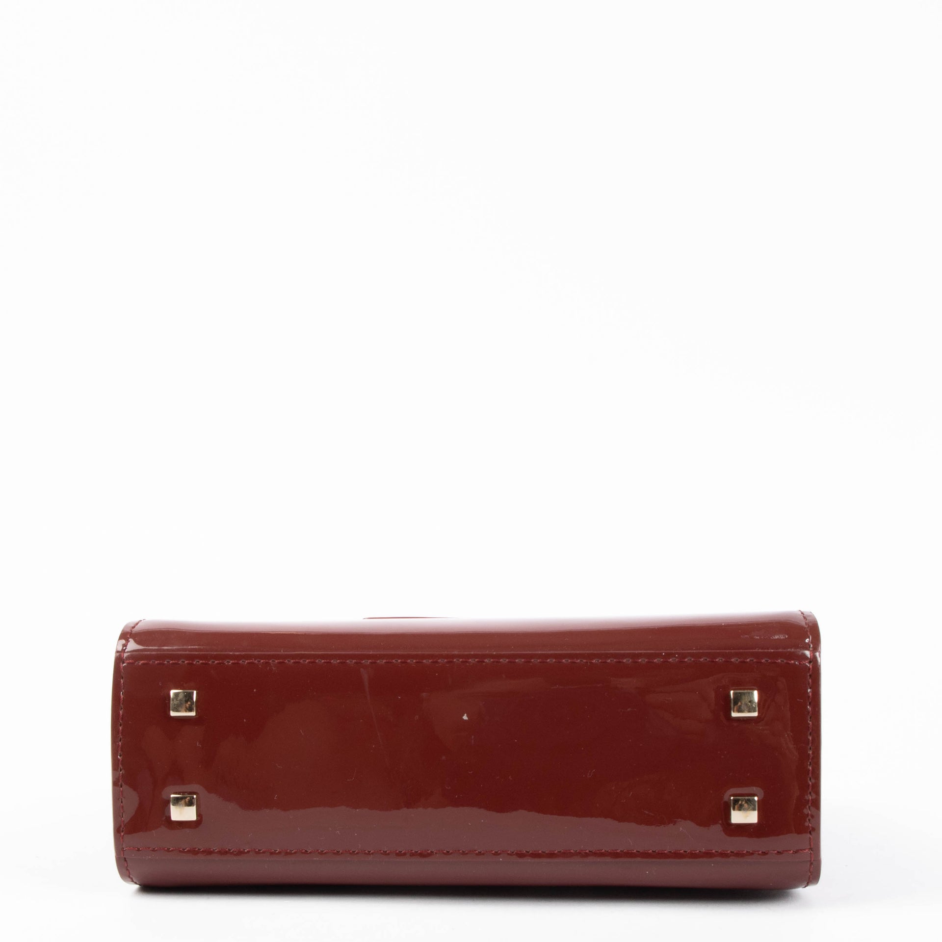 Shop the authentic Delvaux Rouge de Pourpre Vernis Tempête Micro Bag second hand on Labellov.com