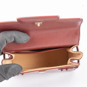 Shop the authentic Delvaux Rouge de Pourpre Vernis Tempête Micro Bag second hand on Labellov.com