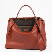 Shop the authentic Fendi Rust Leather Large Peekaboo Handbag second hand on Labellov.com