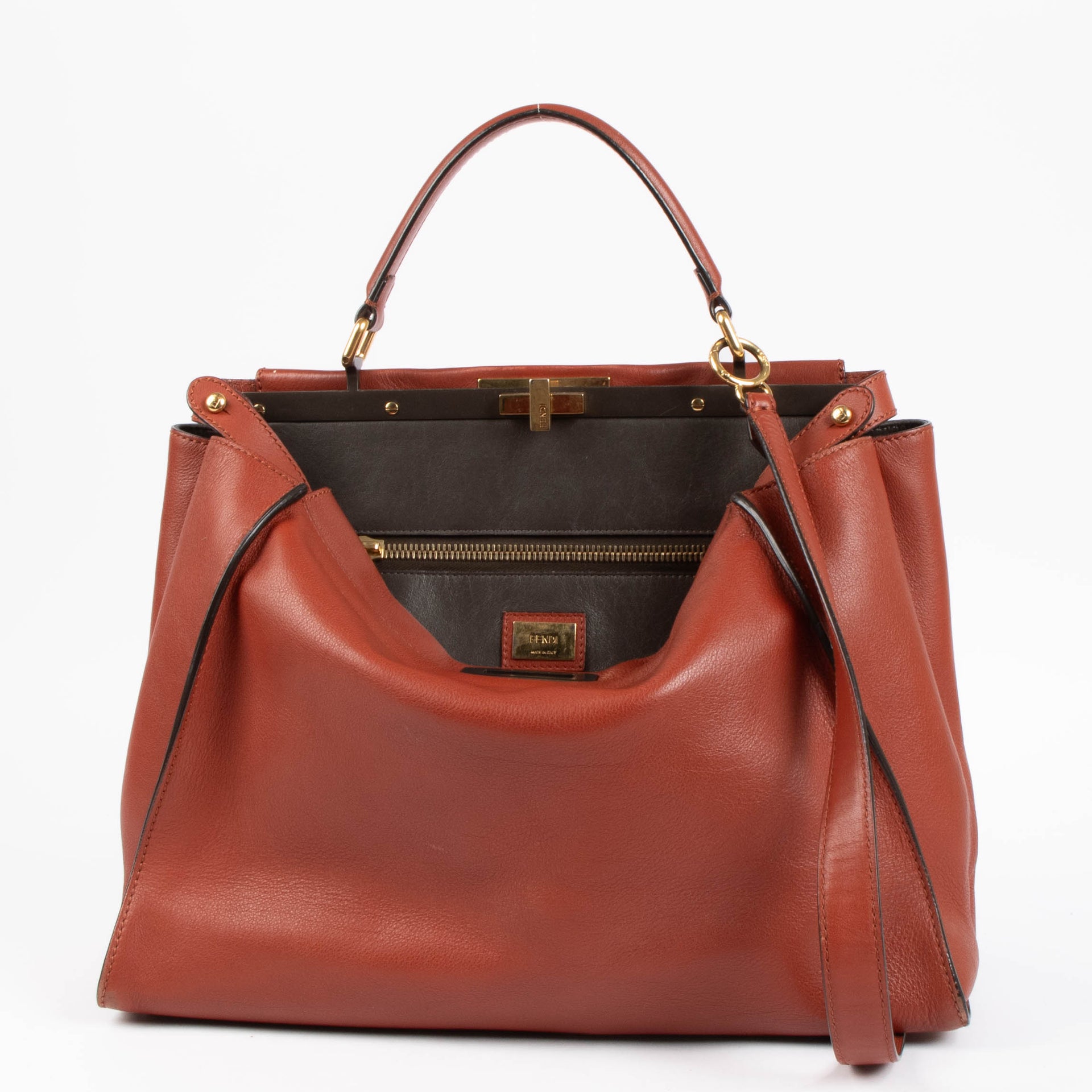 Shop the authentic Fendi Rust Leather Large Peekaboo Handbag second hand on Labellov.com