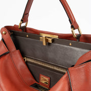 Shop the authentic Fendi Rust Leather Large Peekaboo Handbag second hand on Labellov.com