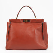 Shop the authentic Fendi Rust Leather Large Peekaboo Handbag second hand on Labellov.com