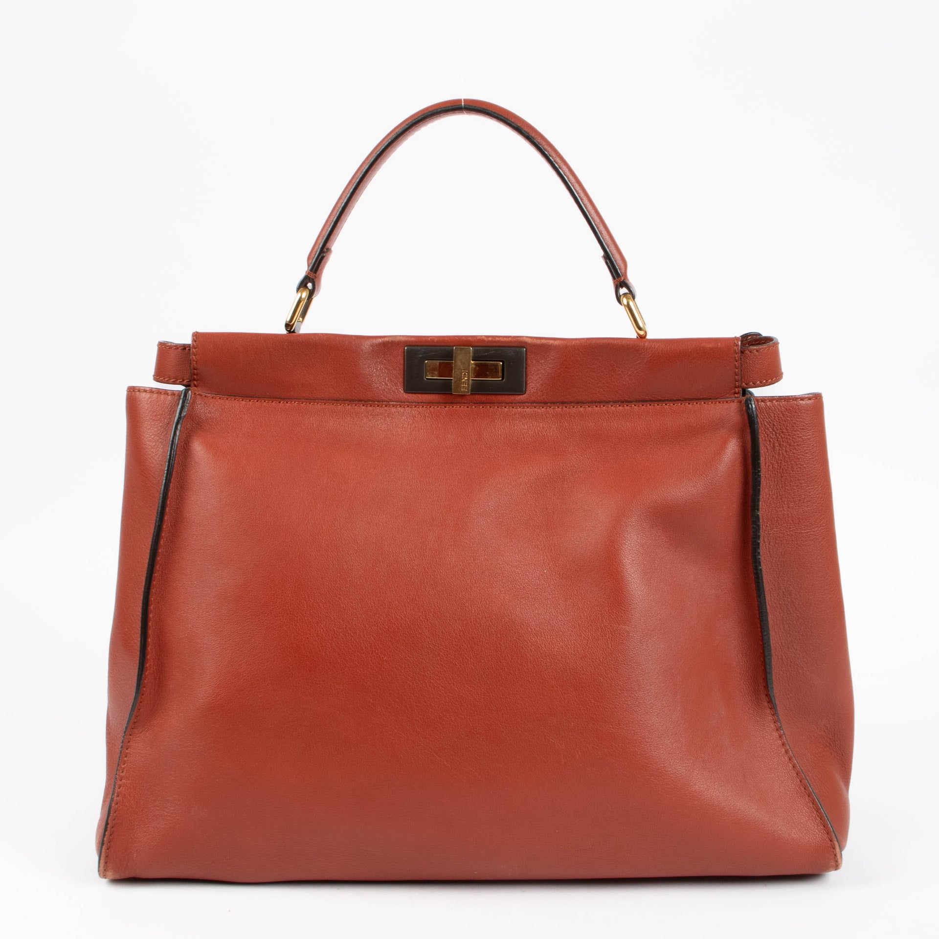 Shop the authentic Fendi Rust Leather Large Peekaboo Handbag second hand on Labellov.com