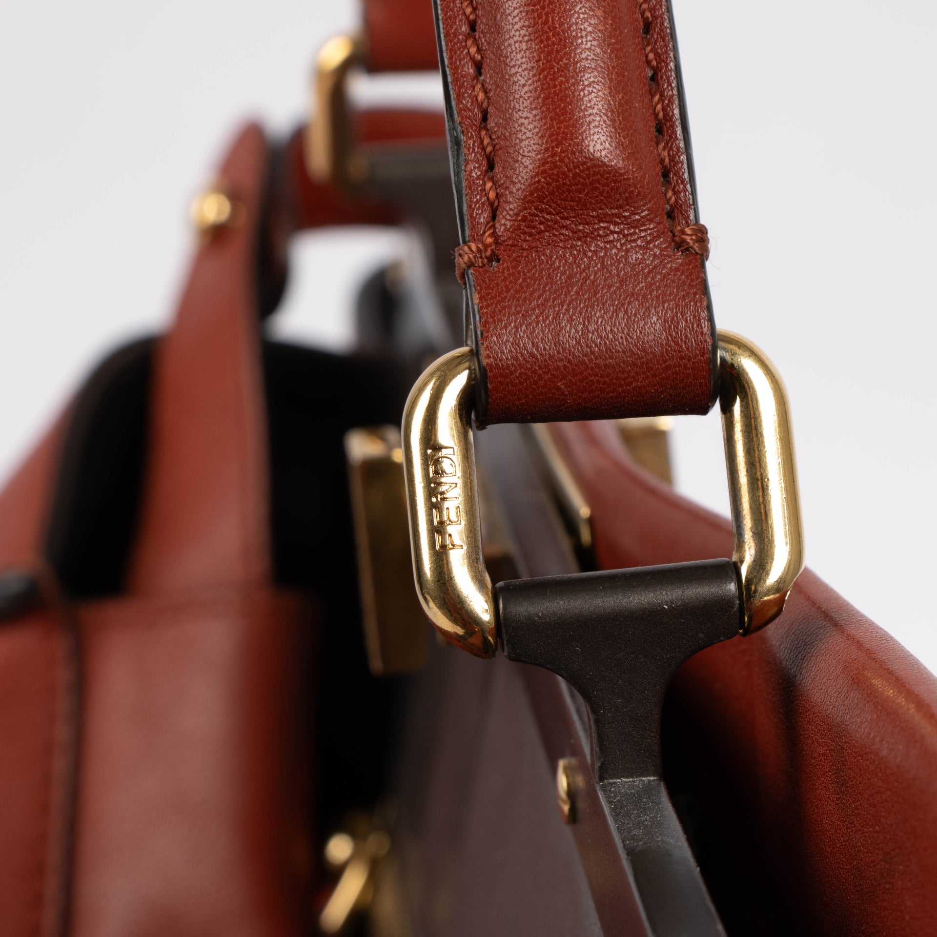 Shop the authentic Fendi Rust Leather Large Peekaboo Handbag second hand on Labellov.com