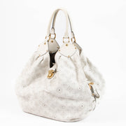 Shop this authentic Louis Vuitton White Mahina Neo L Bag pre-loved on Labellov.com 