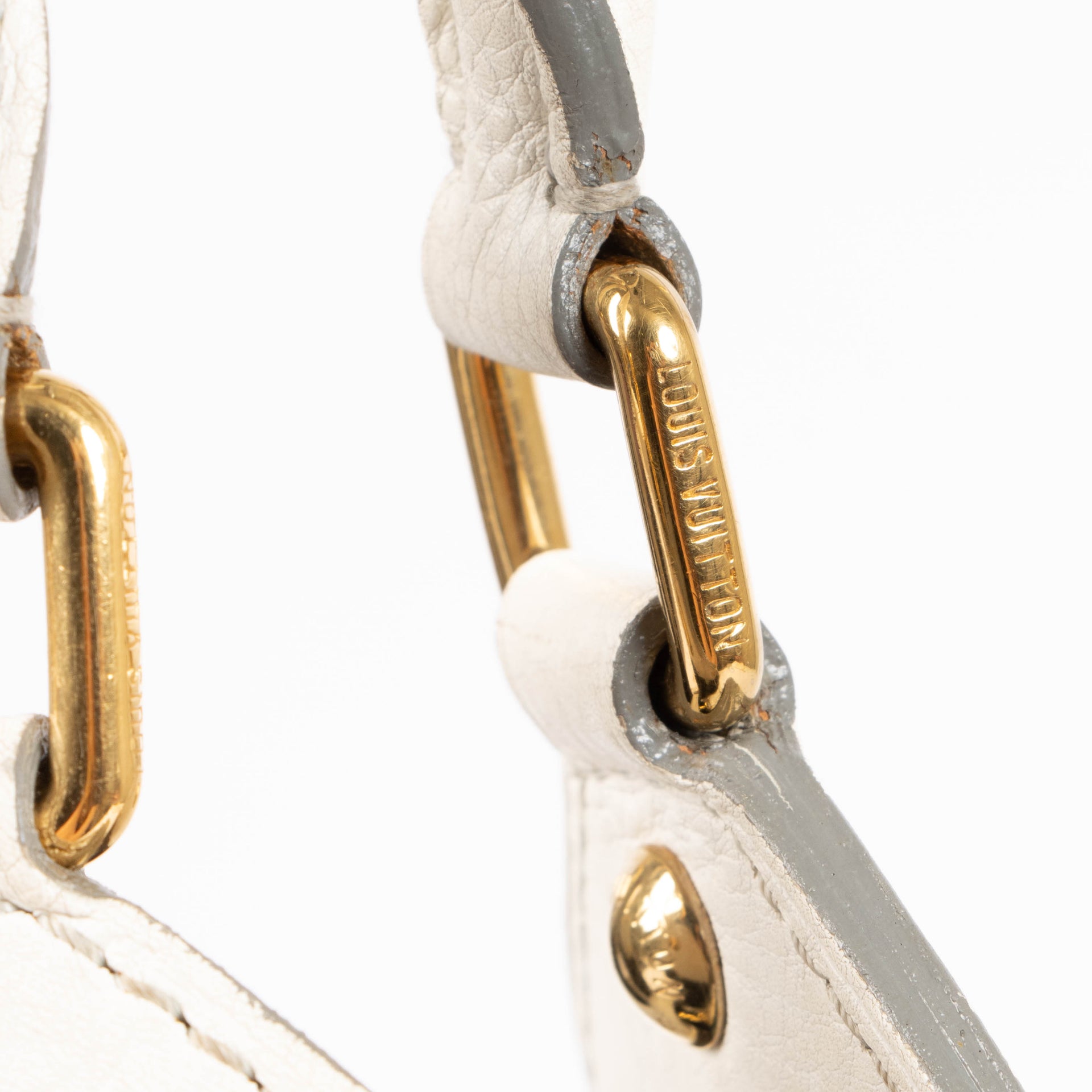 Shop this authentic Louis Vuitton White Mahina Neo L Bag pre-loved on Labellov.com 