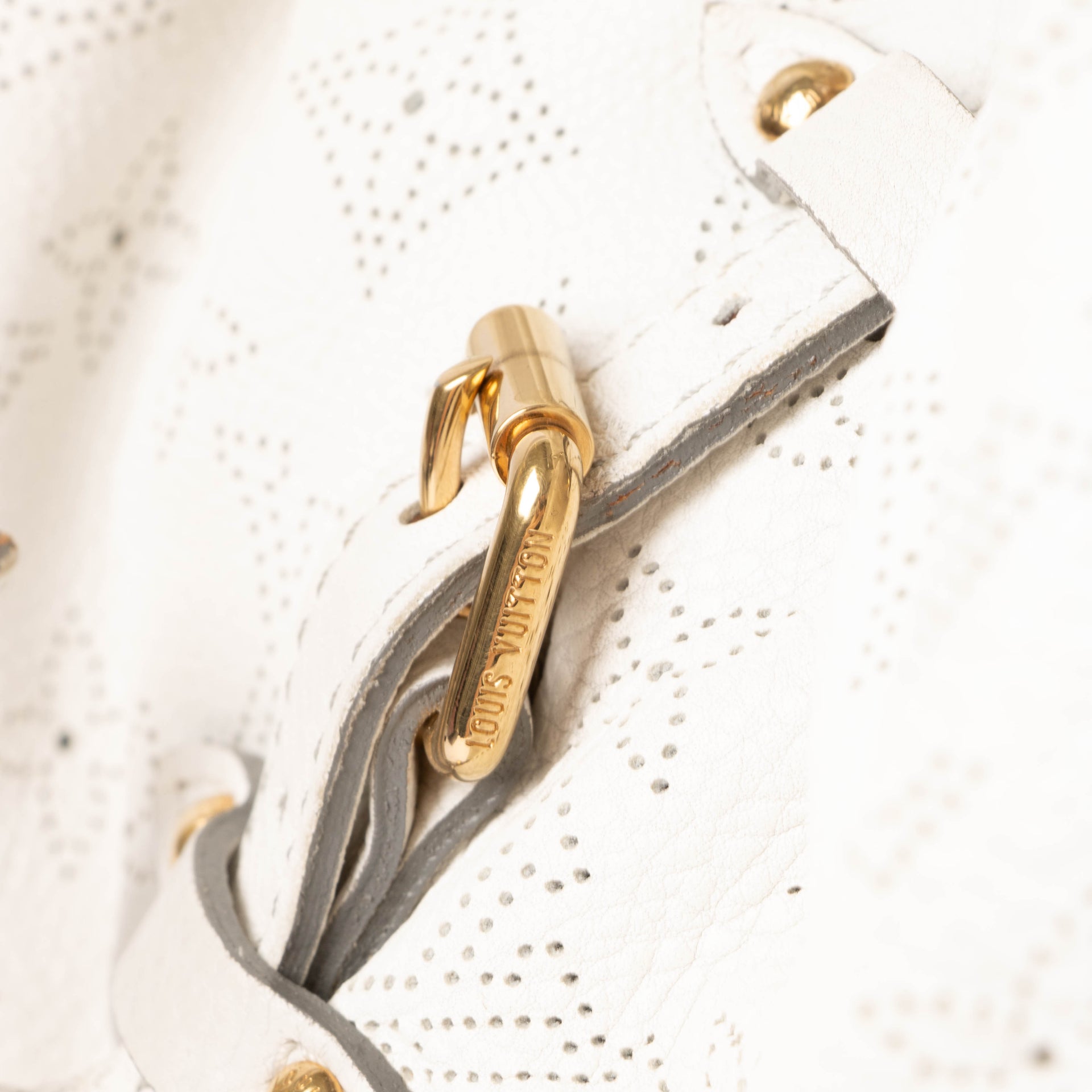 Shop this authentic Louis Vuitton White Mahina Neo L Bag pre-loved on Labellov.com 