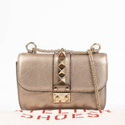 Shop this authentic Valentino Garavani Gold Small Glam Lock Bag pre-loved on Labellov.com