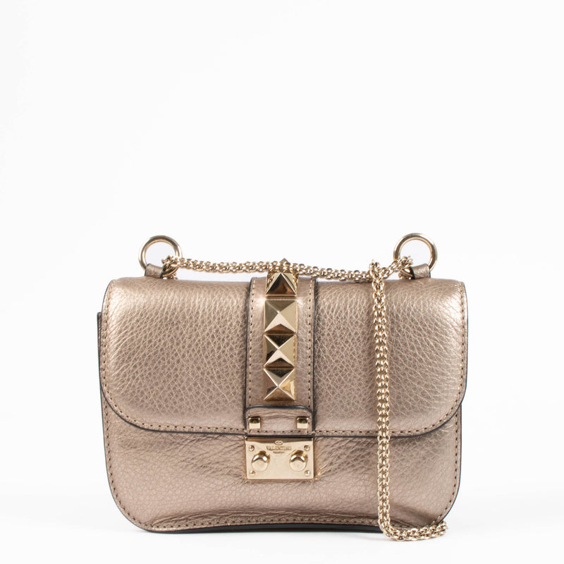 Shop this authentic Valentino Garavani Gold Small Glam Lock Bag pre-loved on Labellov.com