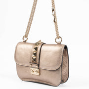 Shop this authentic Valentino Garavani Gold Small Glam Lock Bag pre-loved on Labellov.com