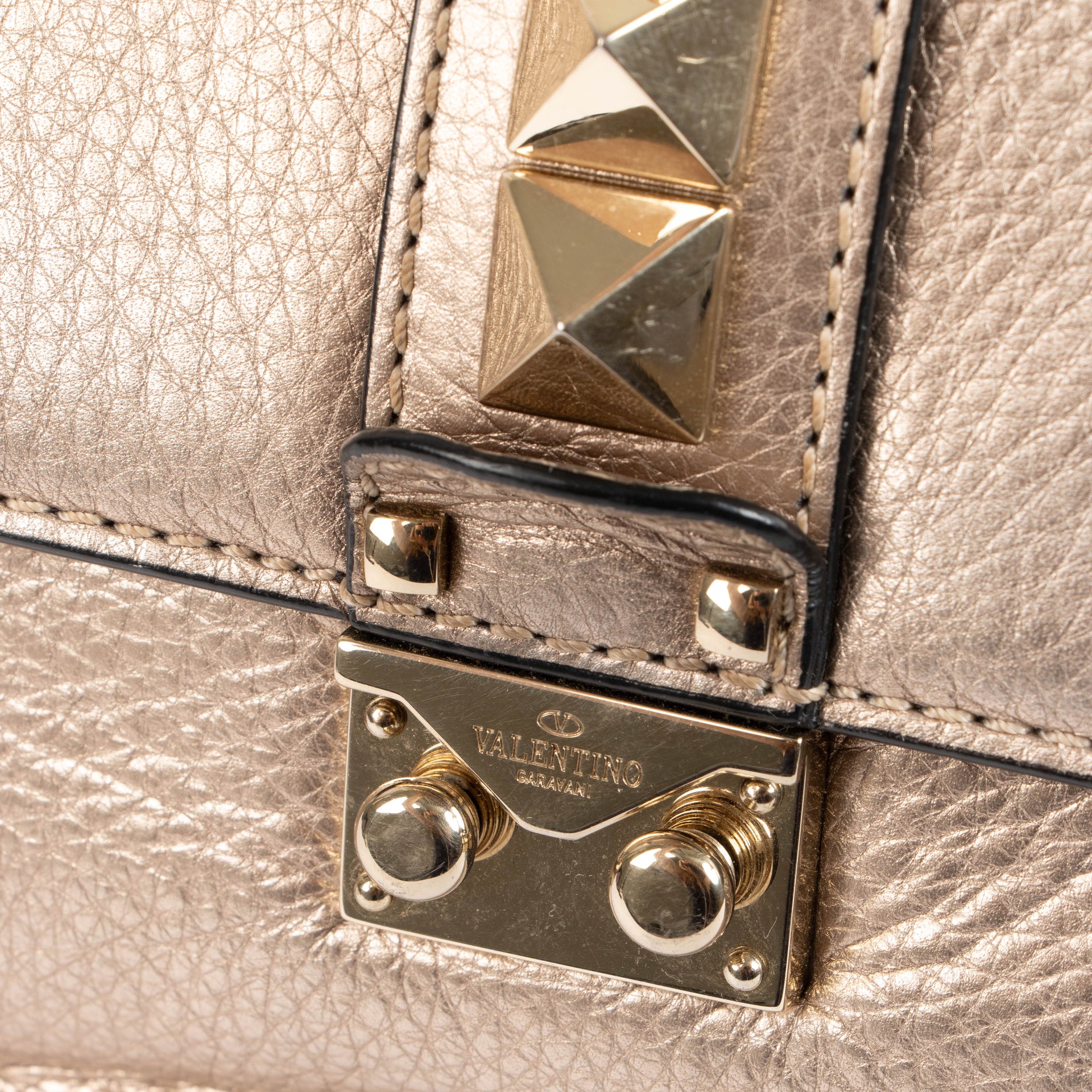Shop this authentic Valentino Garavani Gold Small Glam Lock Bag pre-loved on Labellov.com