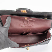 Shop the authentic Chanel Black Caviar Medium Classic 11.12 Handbag second hand on Labellov.com