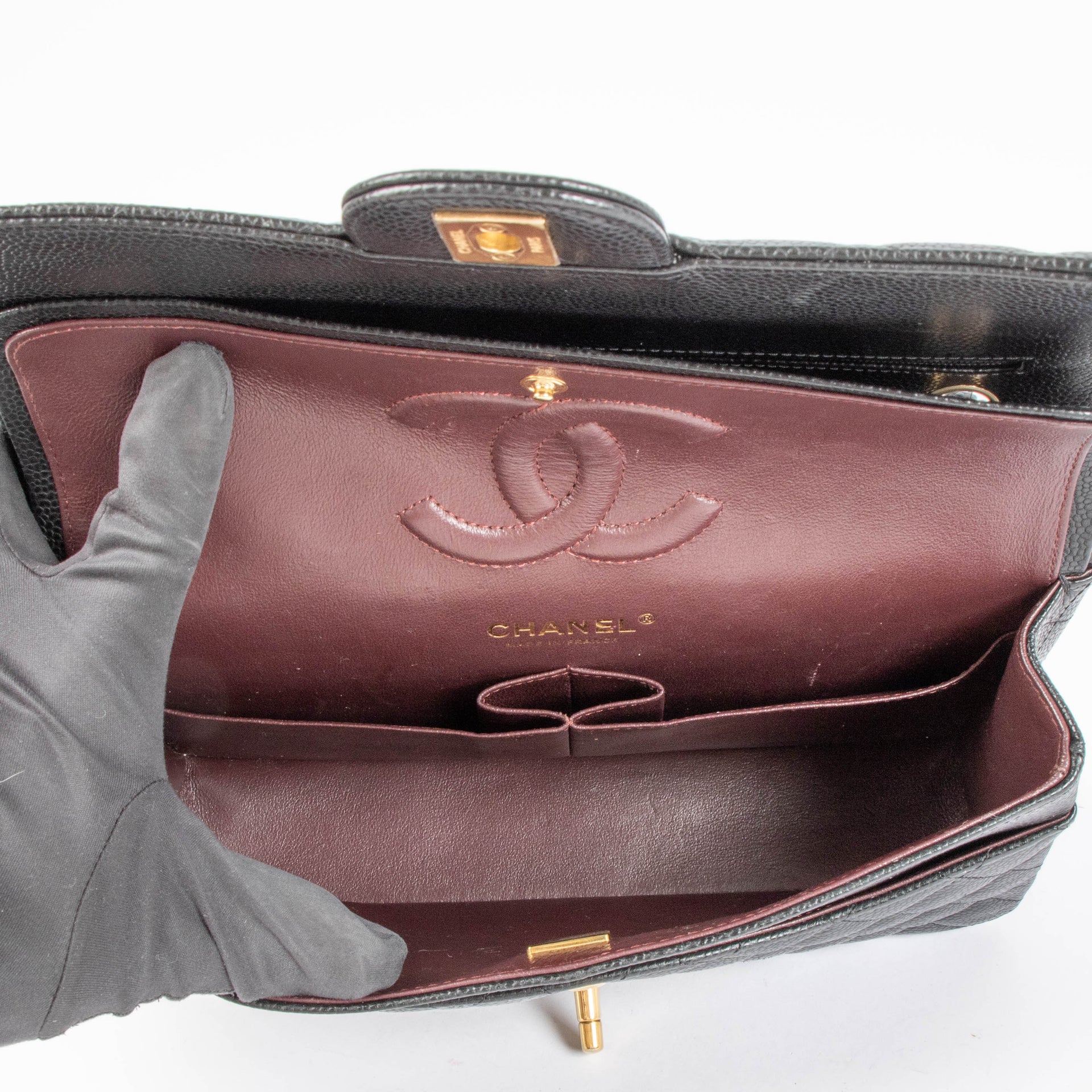 Shop the authentic Chanel Black Caviar Medium Classic 11.12 Handbag second hand on Labellov.com
