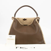 Shop the authentic Fendi Brown Raffia Trim Large Peekaboo X-Lite Bag second hand on Labellov.com