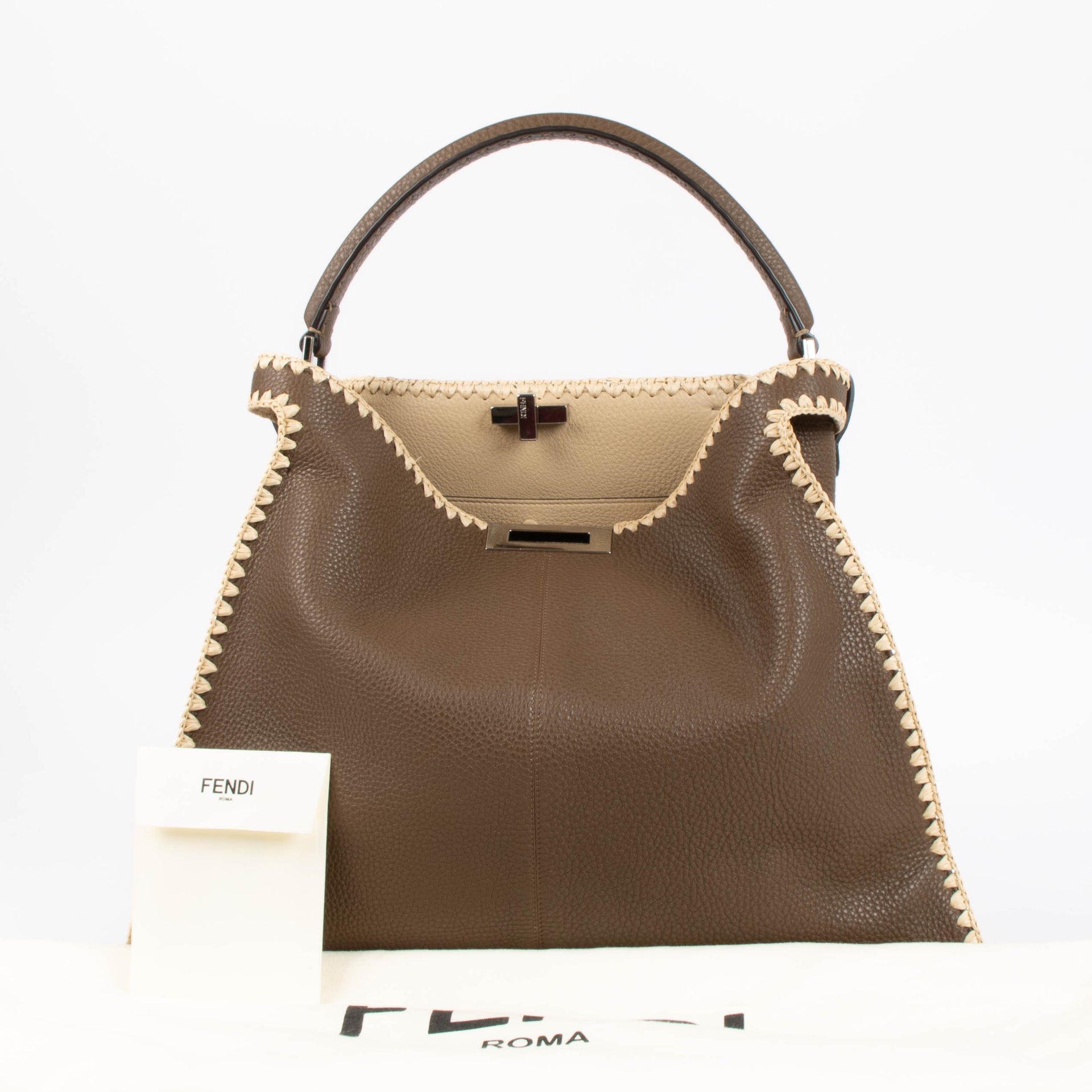 Shop the authentic Fendi Brown Raffia Trim Large Peekaboo X-Lite Bag second hand on Labellov.com