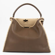 Shop the authentic Fendi Brown Raffia Trim Large Peekaboo X-Lite Bag second hand on Labellov.com