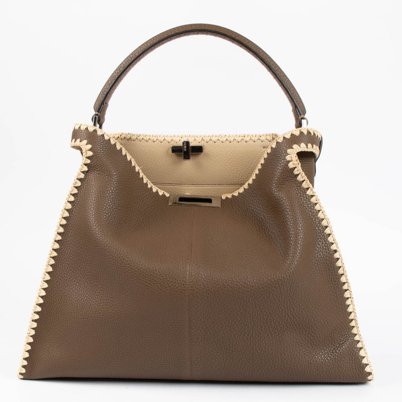 Shop the authentic Fendi Brown Raffia Trim Large Peekaboo X-Lite Bag second hand on Labellov.com