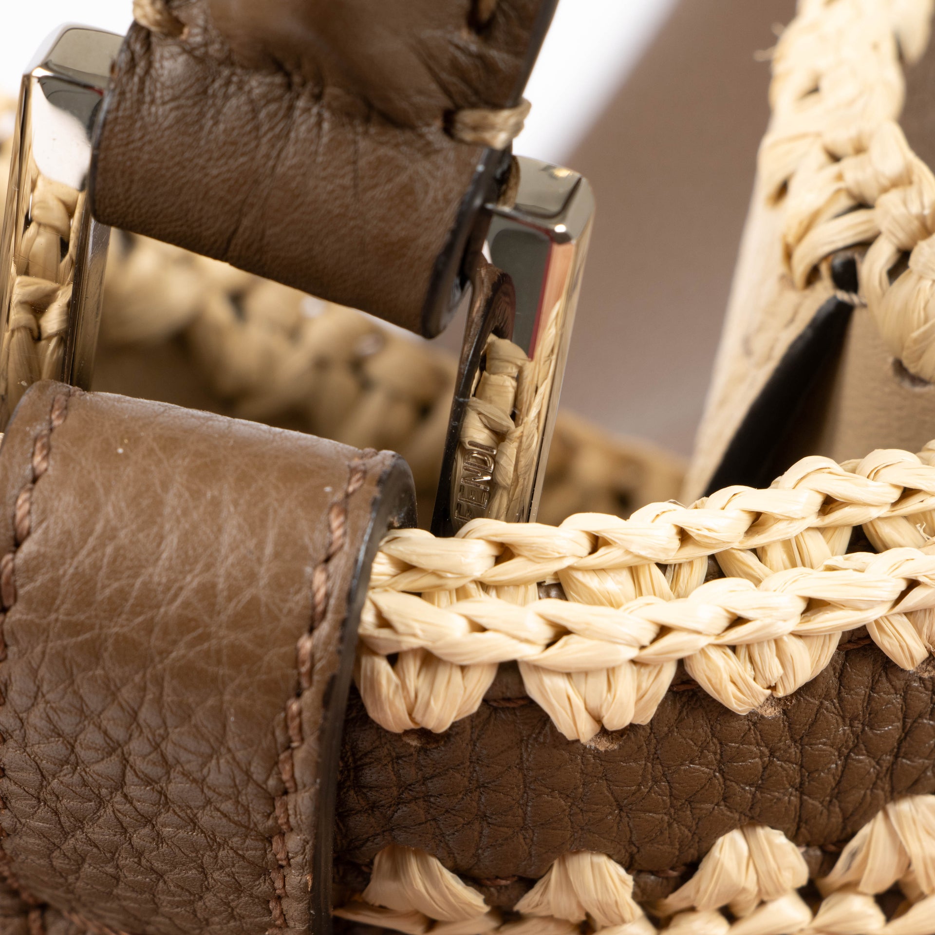 Shop the authentic Fendi Brown Raffia Trim Large Peekaboo X-Lite Bag second hand on Labellov.com