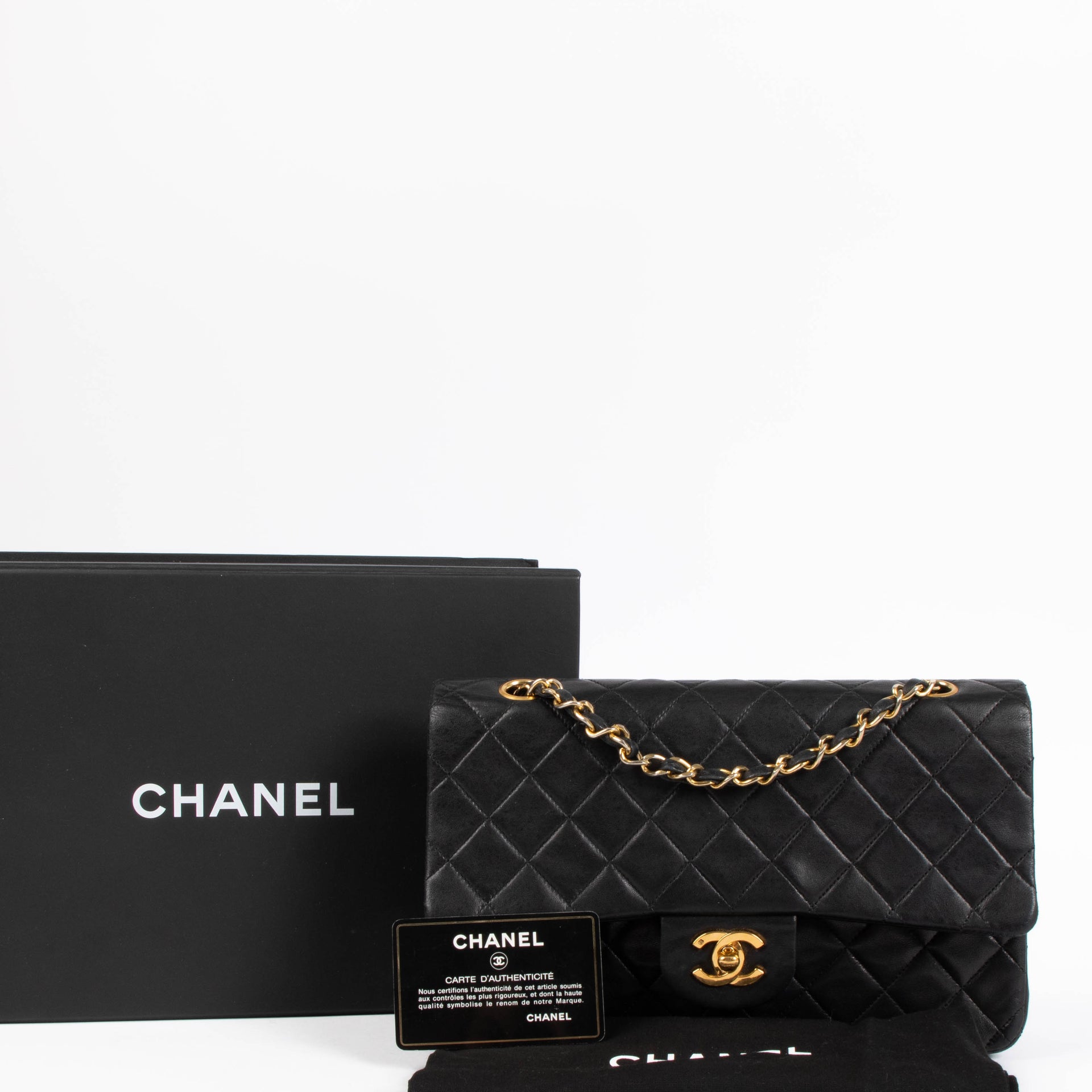 Shop Authentic Chanel Vintage Black Lambskin Medium Classic Flap 11.12 Bag on Labellov.com