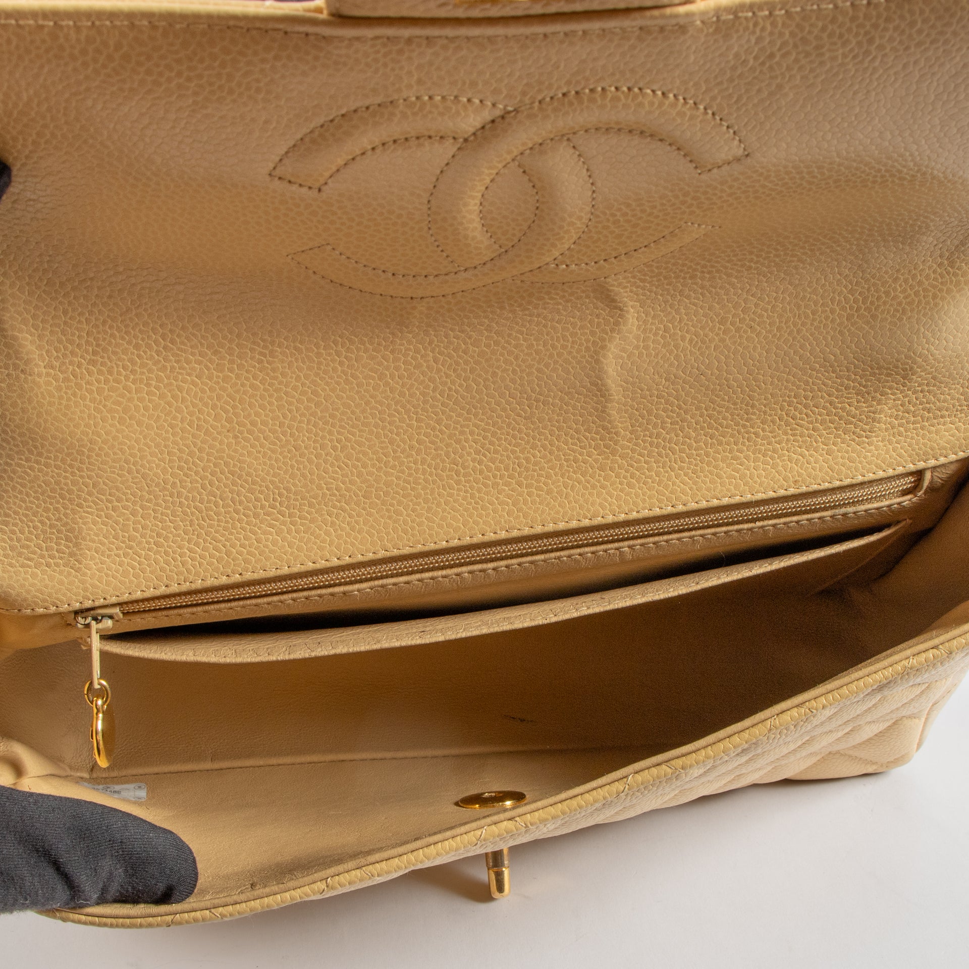 Shop the 100% authentic Chanel Vintage Beige Caviar Kelly Bag second hand on Labellov.com!