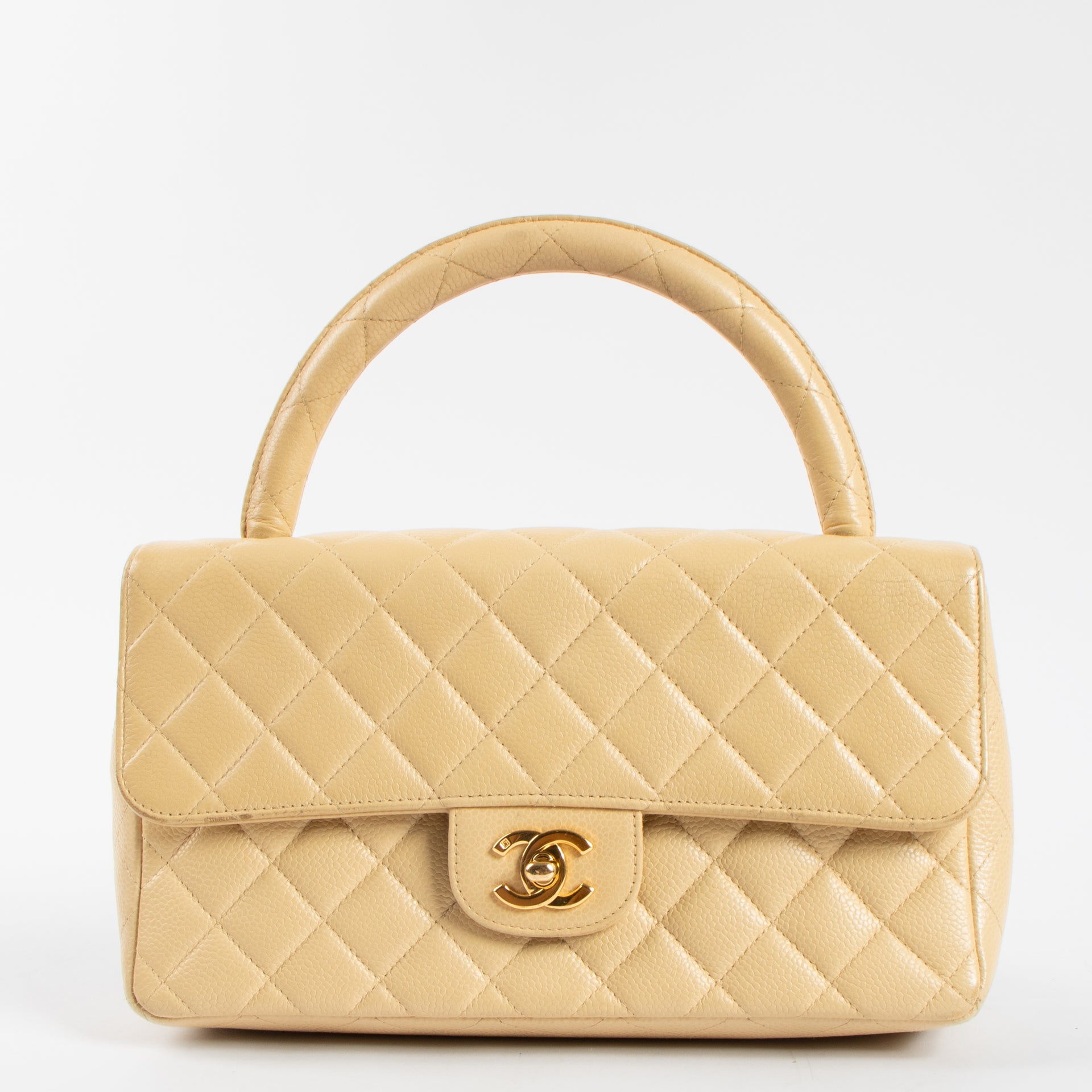 Shop the 100% authentic Chanel Vintage Beige Caviar Kelly Bag second hand on Labellov.com!