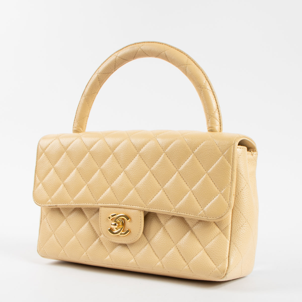 Shop the 100% authentic Chanel Vintage Beige Caviar Kelly Bag second hand on Labellov.com!
