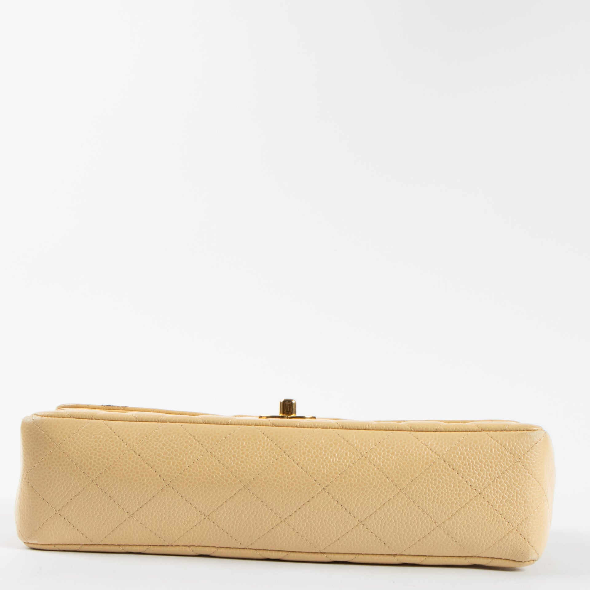 Shop the 100% authentic Chanel Vintage Beige Caviar Kelly Bag second hand on Labellov.com!