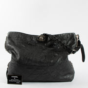 Shop the 100% authentic Chanel Black Calfskin Hobo Bag second hand on Labellov.com!