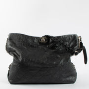 Shop the 100% authentic Chanel Black Calfskin Hobo Bag second hand on Labellov.com!