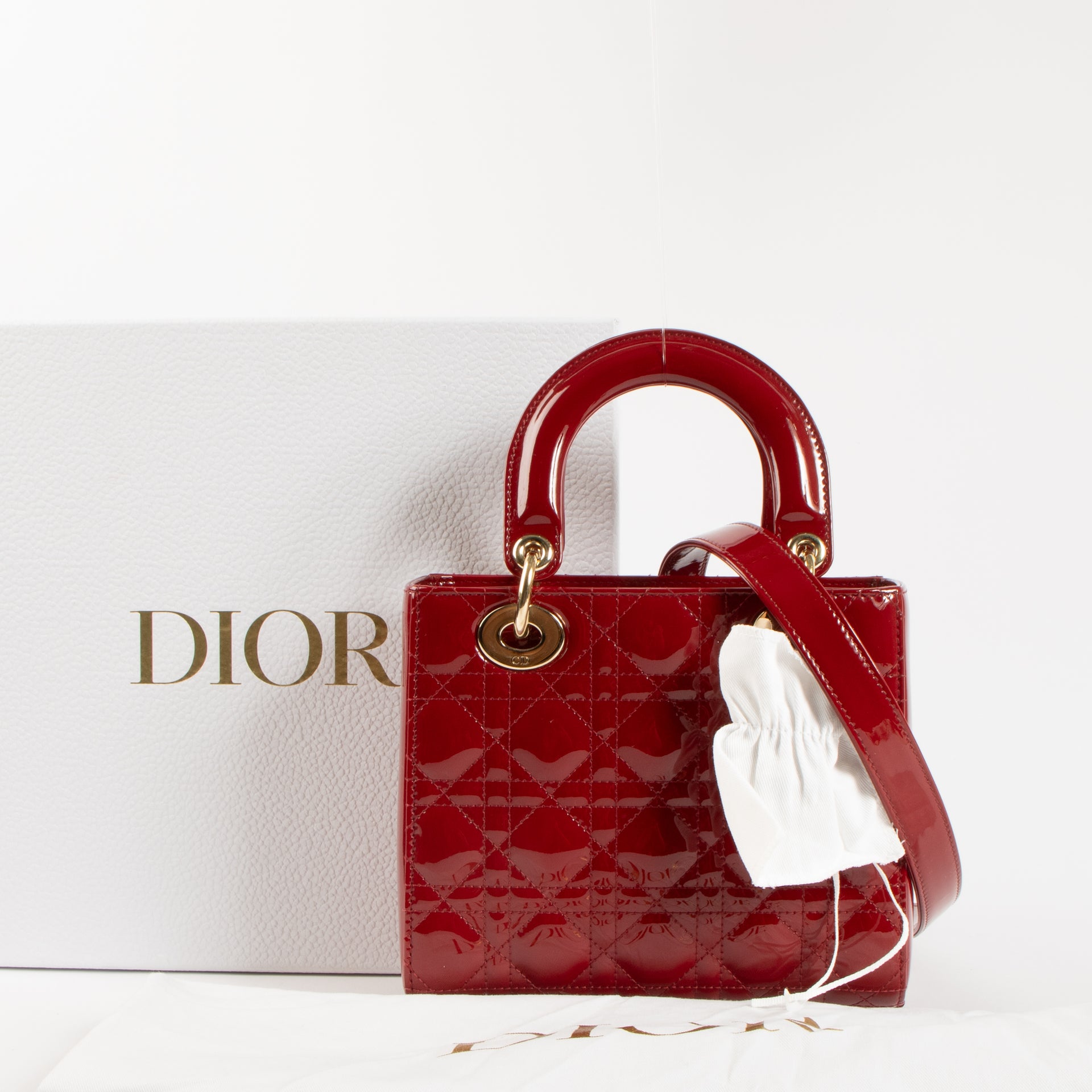 Shop the 100% authentic Christian Dior Cerise Patent Leather Lady Dior Small Bag second hand on Labellov.com!