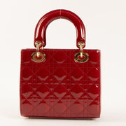Shop the 100% authentic Christian Dior Cerise Patent Leather Lady Dior Small Bag second hand on Labellov.com!