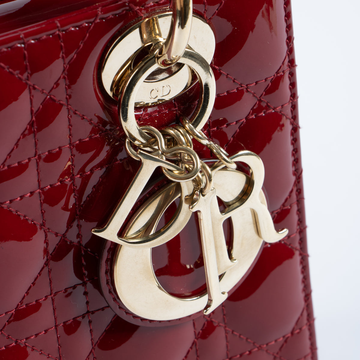 Shop the 100% authentic Christian Dior Cerise Patent Leather Lady Dior Small Bag second hand on Labellov.com!