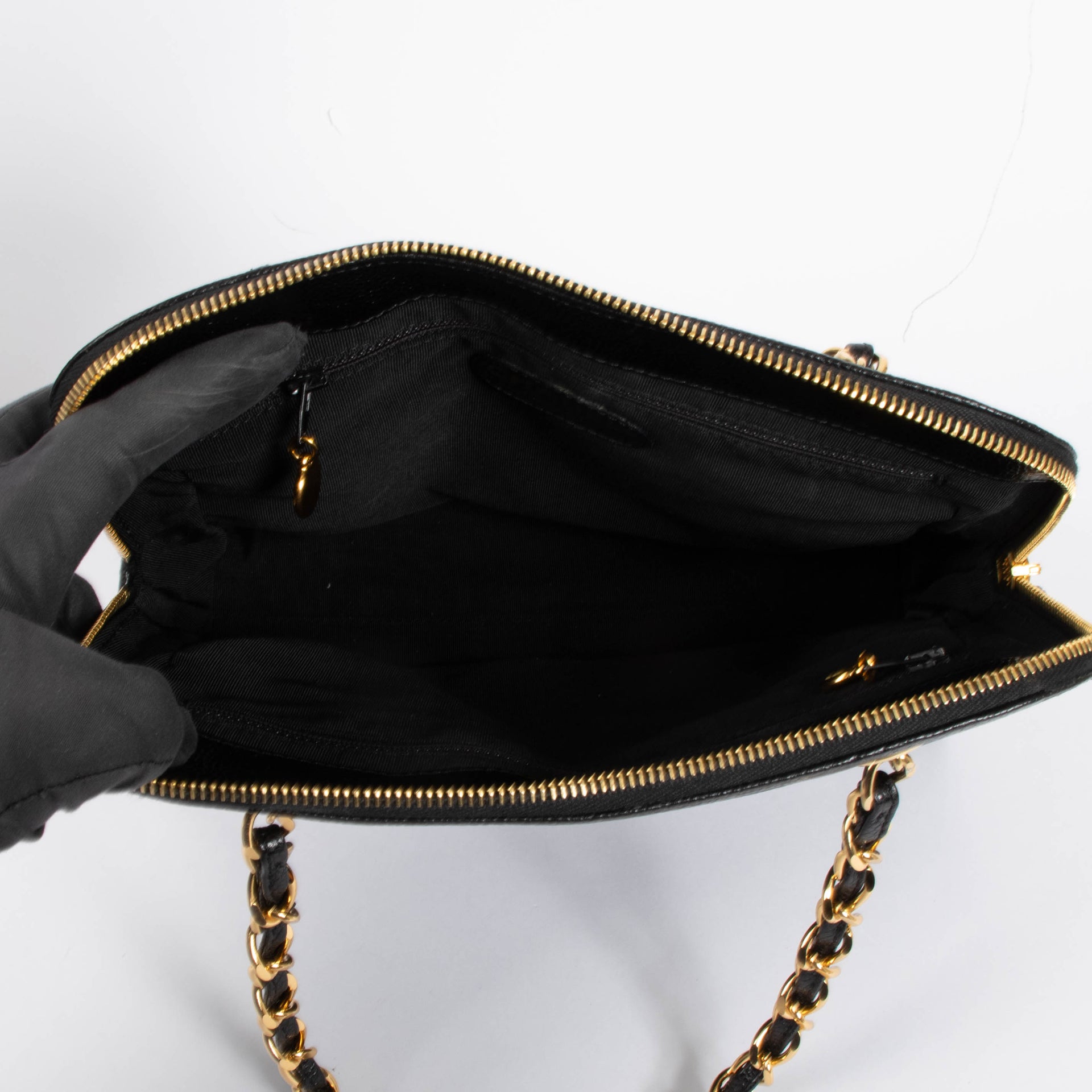 Shop the authentic Chanel Black Caviar Vintage Logo Tote Bag 