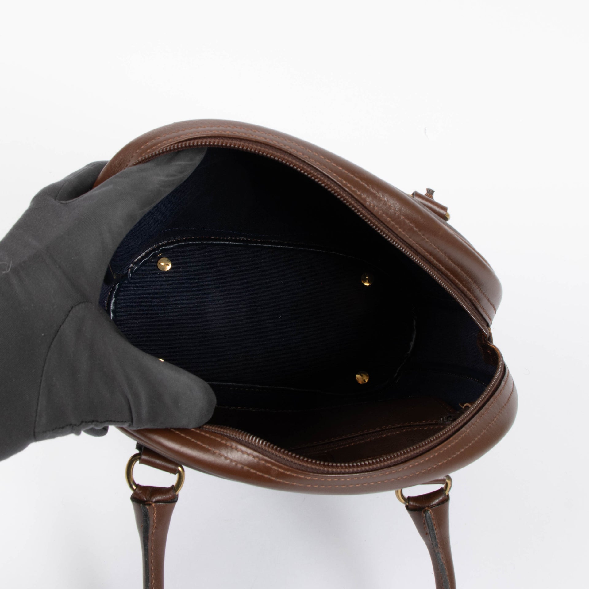 Shop the authentic Christian Dior Brown Oblique Vintage Trotter Bag second hand on Labellov.com