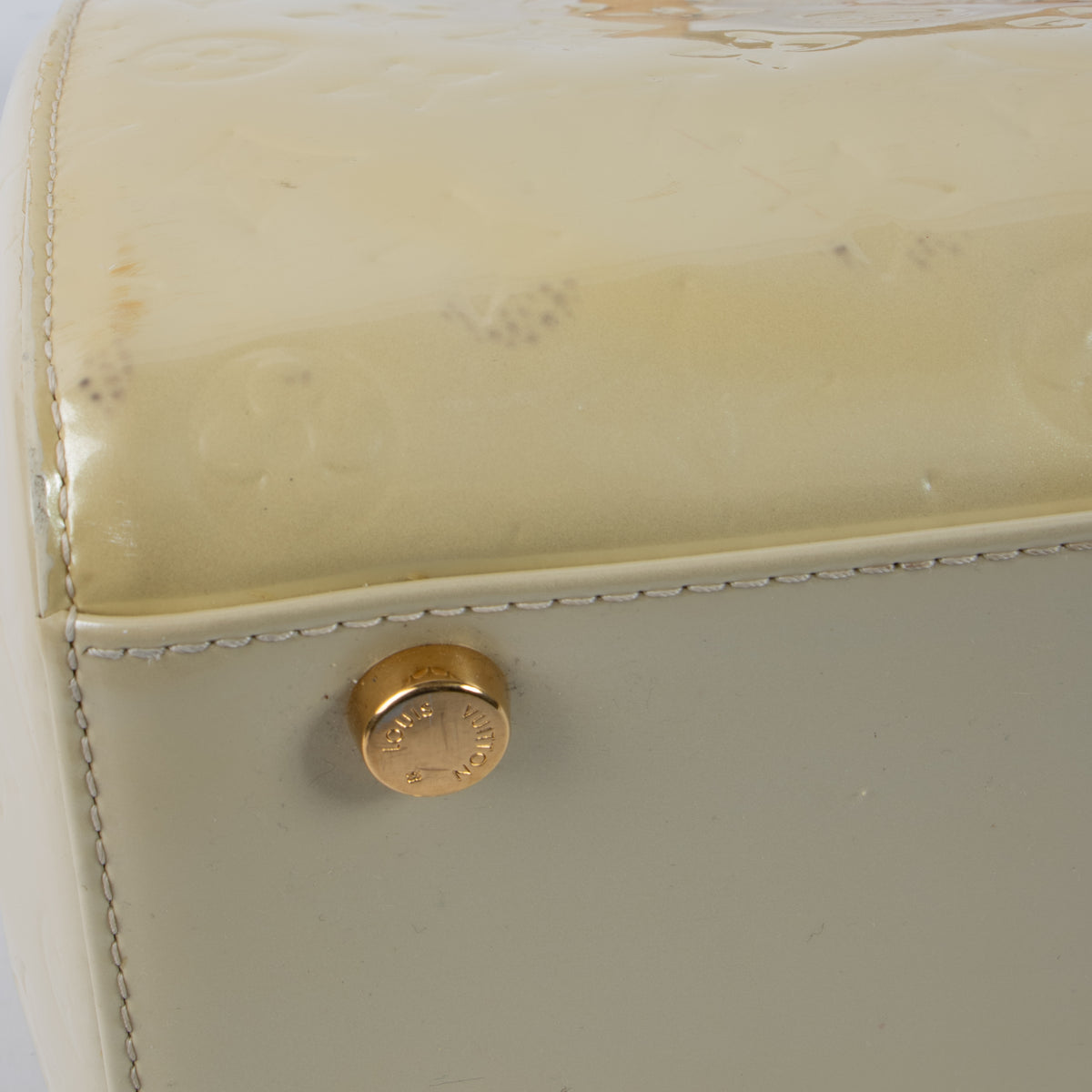 Shop this authentic Louis Vuitton Blanc Corail Monogram Vernis Brea GM Bag pre-loved on Labellov.com