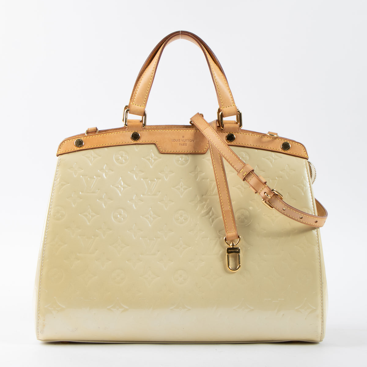 Shop this authentic Louis Vuitton Blanc Corail Monogram Vernis Brea GM Bag pre-loved on Labellov.com