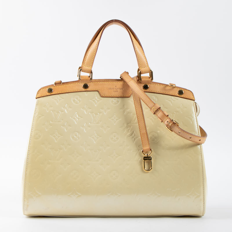 Shop this authentic Louis Vuitton Blanc Corail Monogram Vernis Brea GM Bag pre-loved on Labellov.com
