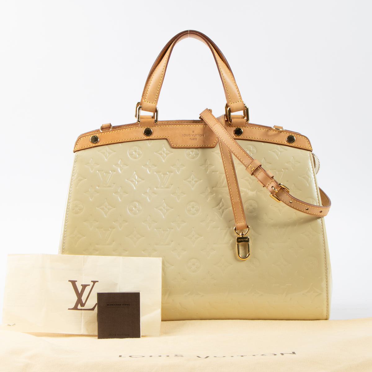 Shop this authentic Louis Vuitton Blanc Corail Monogram Vernis Brea GM Bag pre-loved on Labellov.com