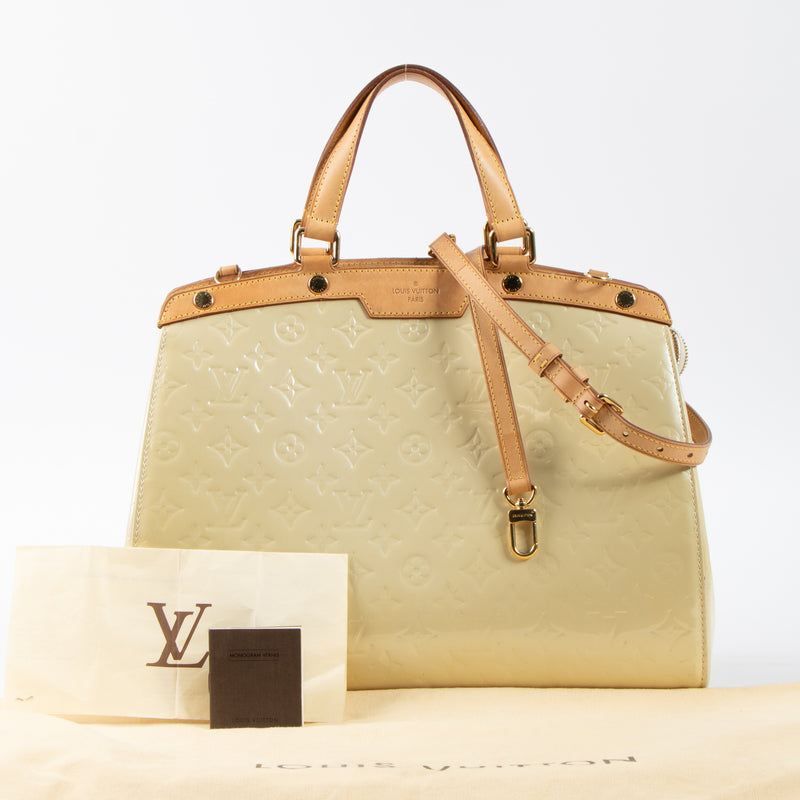 Shop this authentic Louis Vuitton Blanc Corail Monogram Vernis Brea GM Bag pre-loved on Labellov.com