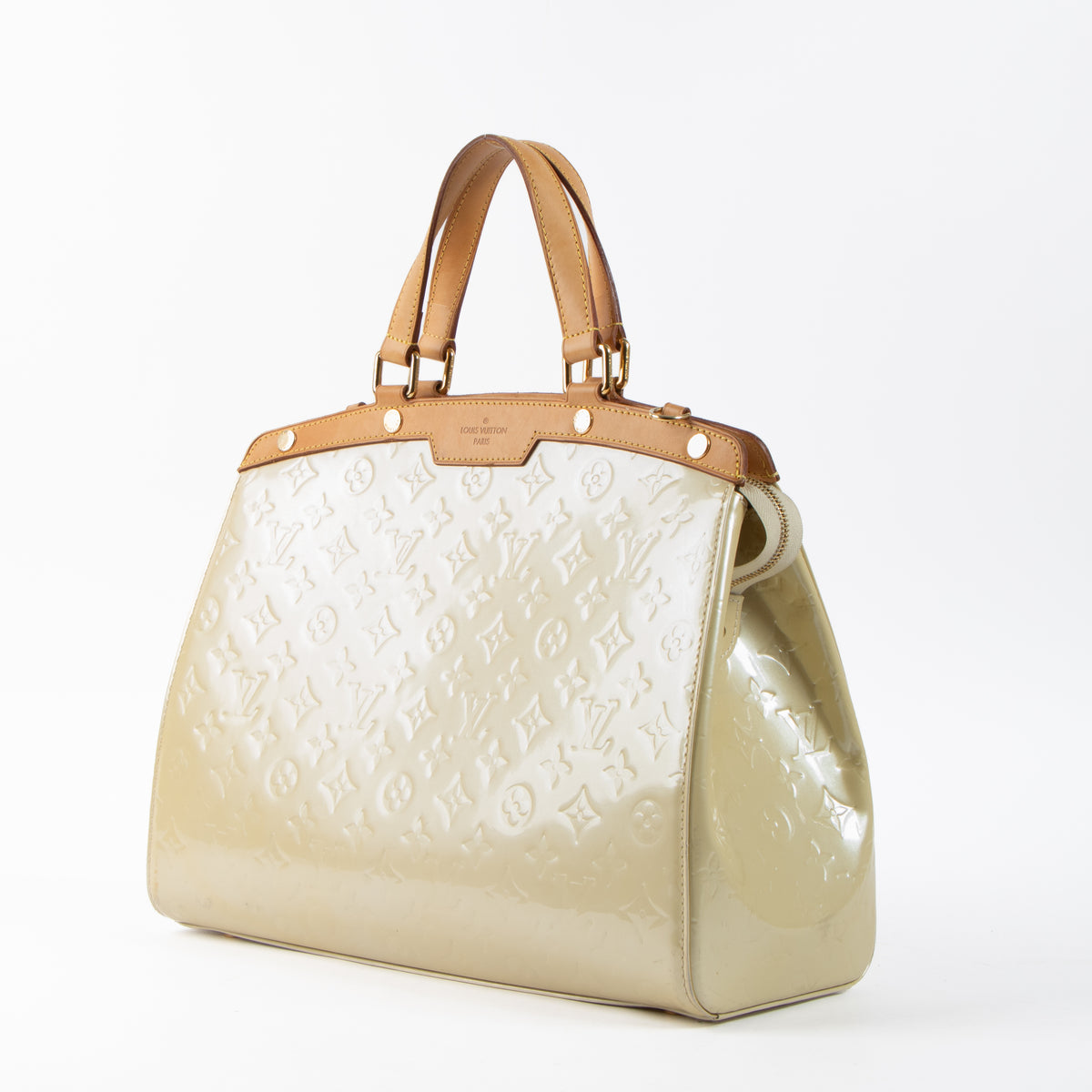 Shop this authentic Louis Vuitton Blanc Corail Monogram Vernis Brea GM Bag pre-loved on Labellov.com