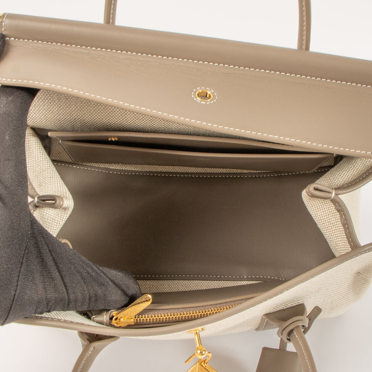 Shop this authentic Loro Piana Natural/Almond Tree Canvas Loom L25 Bag pre-loved on labellov.com