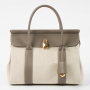 Shop this authentic Loro Piana Natural/Almond Tree Canvas Loom L25 Bag pre-loved on labellov.com