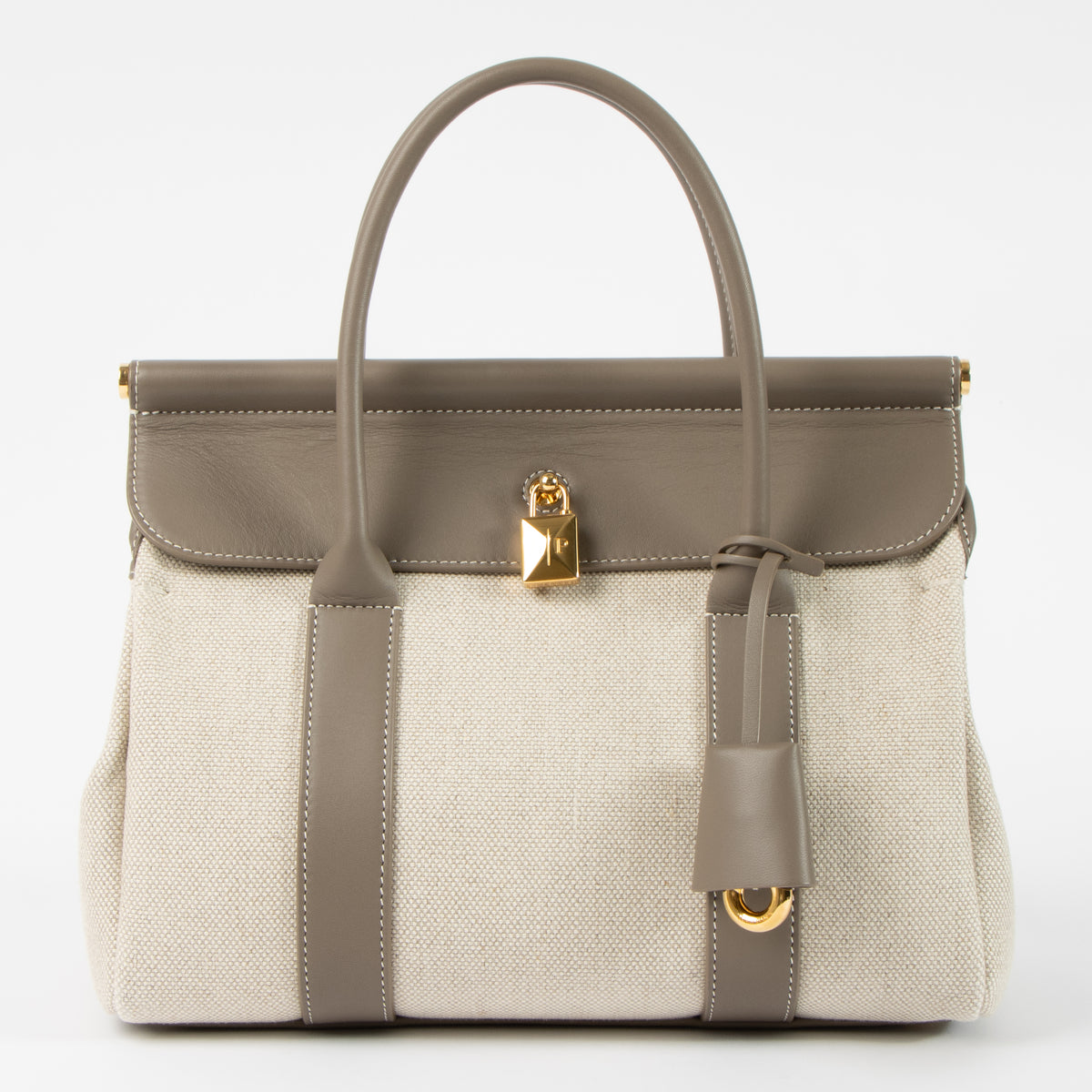 Shop this authentic Loro Piana Natural/Almond Tree Canvas Loom L25 Bag pre-loved on labellov.com
