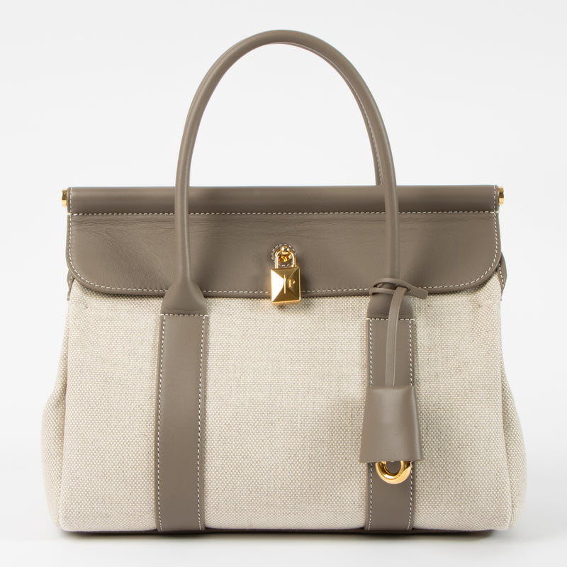 Shop this authentic Loro Piana Natural/Almond Tree Canvas Loom L25 Bag pre-loved on labellov.com