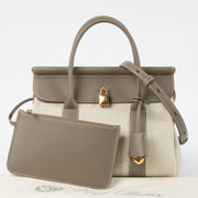 Shop this authentic Loro Piana Natural/Almond Tree Canvas Loom L25 Bag pre-loved on labellov.com