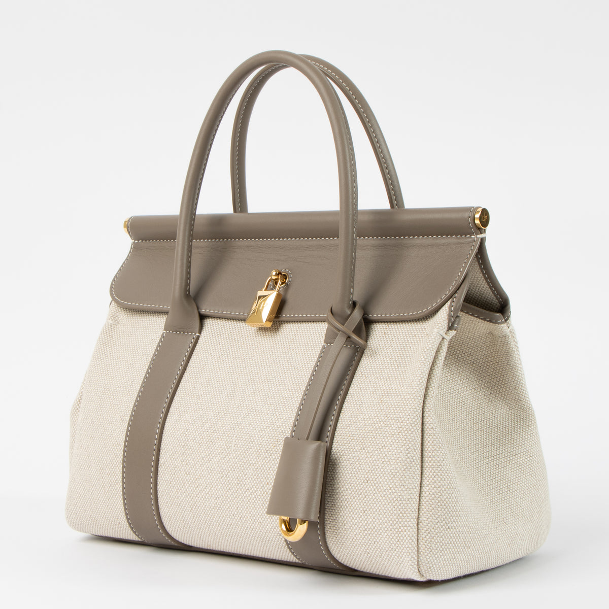 Shop this authentic Loro Piana Natural/Almond Tree Canvas Loom L25 Bag pre-loved on labellov.com