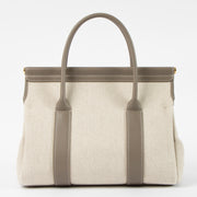 Shop this authentic Loro Piana Natural/Almond Tree Canvas Loom L25 Bag pre-loved on labellov.com